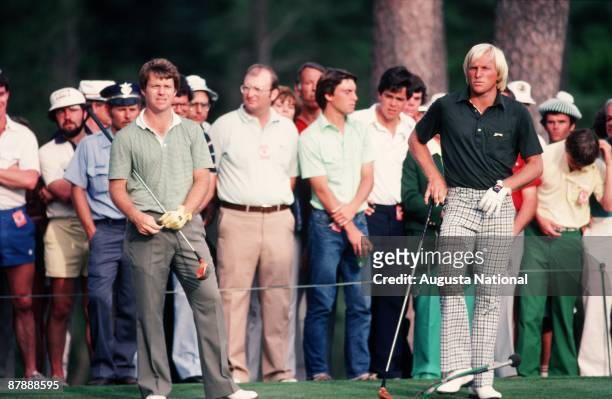 Tom Watson and Greg Norman wait to tee off during the 1981 Masters Tournament at Augusta National Golf Club on April 1981 in Augusta, Georgia.