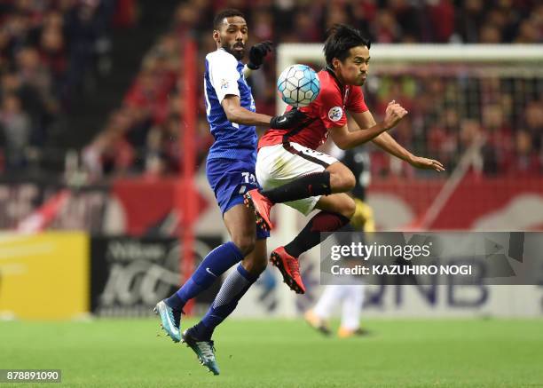 Al Hilal's defender Mohammed Jahfali fights for the ball with Urawa Red Diamonds' midfielder Shinzo Koroki during the second leg of the AFC Champions...