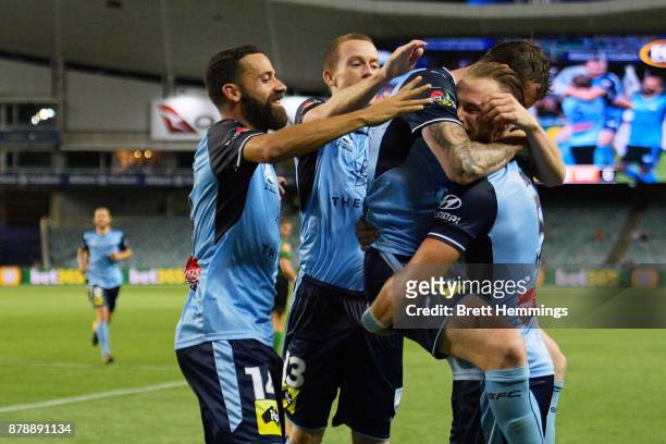 Sebastian Ryall of Sydney celebrates scoring a goal with team mates during the round eight A-League match between Sydney FC and the Brisbane Roar at...
