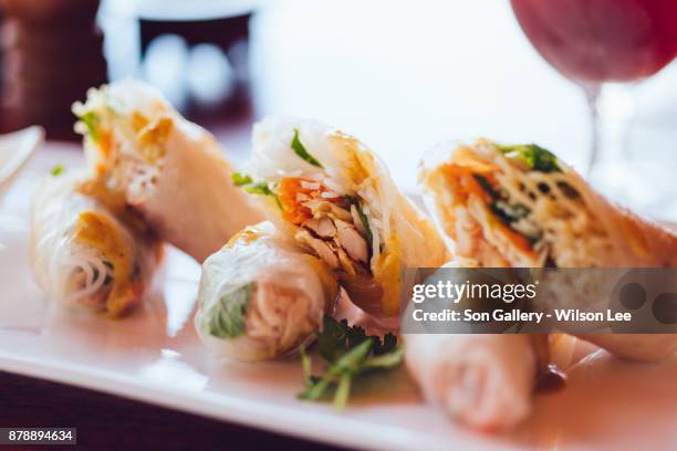 chicken spring rolls stacked - chicken spring rolls stock pictures, royalty-free photos & images