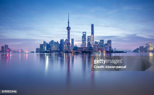 lujiazui financial district in shanghai at dusk , china , asia - shanghai stock pictures, royalty-free photos & images
