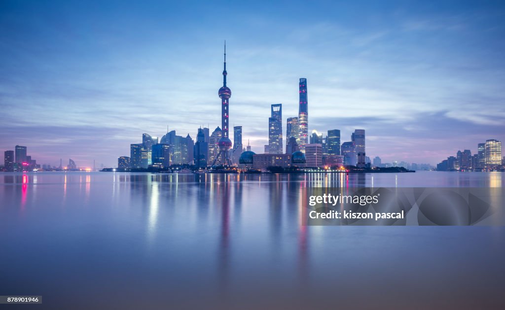 Lujiazui financial district in Shanghai at dusk , China , Asia