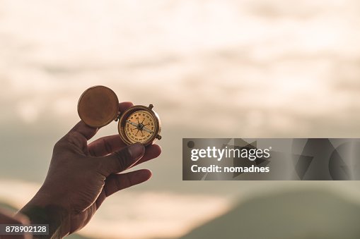 Den Golding Navigating Hand Golding Compass To Navigate Direction Travel Direction Discovery ...