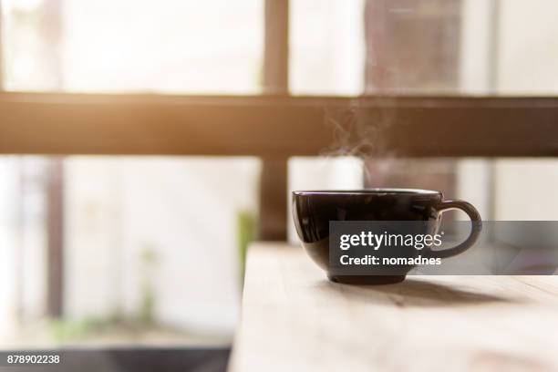 hot coffee cup on table,breakfast beverage in the morning - dawn window stock pictures, royalty-free photos & images