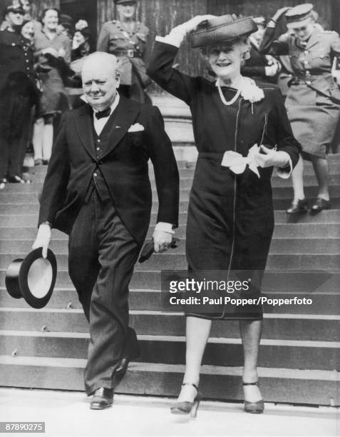 British Prime Minister, Winston Churchill with his wife Clementine leaving a thanksgiving service at St Paul's Cathedral, held on the first Sunday...