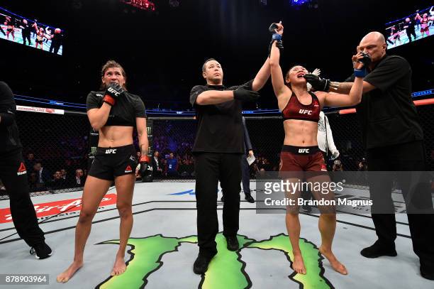 Yan Xiaonan of China celebrates after her decision victory over Kailin Curran in their women's strawweight bout during the UFC Fight Night event...