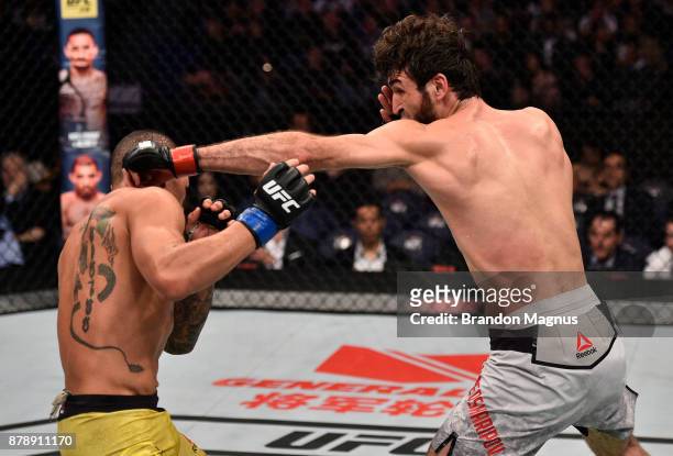Zabit Magomedsharipov of Russia punches Sheymon Moraes of Brazil in their featherweight bout during the UFC Fight Night event inside the...