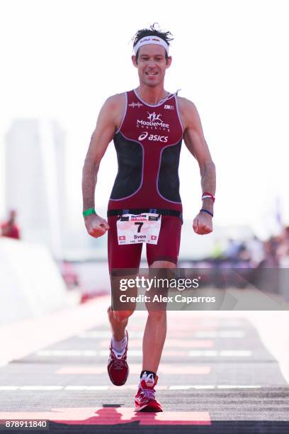 Sven Riederer of Switzerland reacts as he finishes in 3rd place the men's race of IRONMAN 70.3 Middle East Championship Bahrain on November 25, 2017...