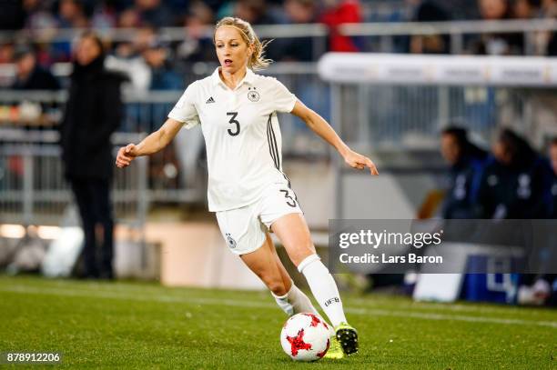 Kathrin Hendrich of Germany runs with the ball during the Germany v France Women's International Friendly match at Schueco Arena on November 24, 2017...