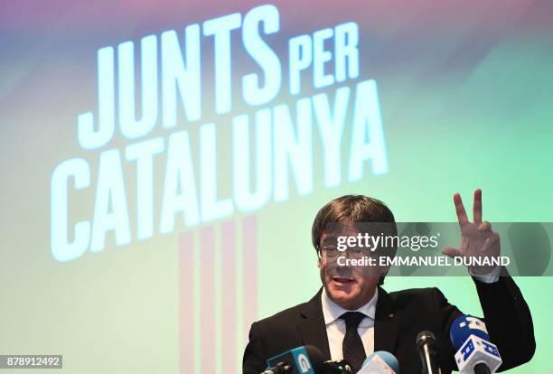 Deposed Catalan leader Carles Puigdemont gives a press conference in Oostkamp, near Brugge, on November 25 to announce his candidacy for Catalan...