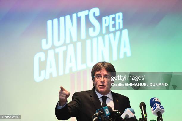 Deposed Catalan leader Carles Puigdemont gives a press conference in Oostkamp, near Brugge, on November 25 to announce his candidacy for Catalan...