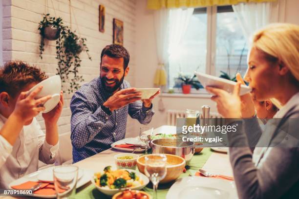 family on weekend luch at home - soup stock pictures, royalty-free photos & images