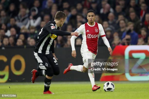 Nils Rutten of Borussia Monchengladbach, Justin Kluivert of Ajax during the international friendly match between Ajax Amsterdam and Borussia...