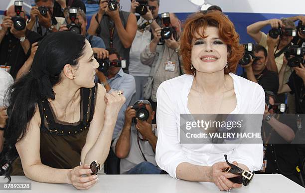 French director and actress Fanny Ardant and Israeli actress Ronit Elkabetz pose during the photocall of "Cendres et Sang" presented out of...