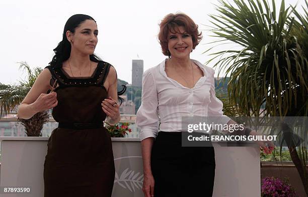 French director and actress Fanny Ardant and Israeli actress Ronit Elkabetz pose during the photocall of the movie "Cendres et Sang" presented out of...