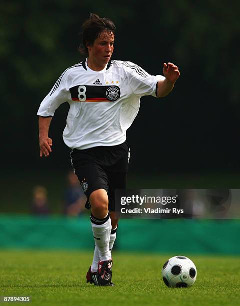 Fabian Schnellhardt of Germany runs with the ball during a friendly match between Germany and U.S.A. At the Hoher Busch stadium on May 21, 2009 in...