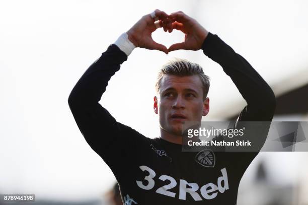 Ezgjan Alioski of Leeds United celebrates to the fans after scoring during the Sky Bet Championship match between Barnsley and Leeds United at...