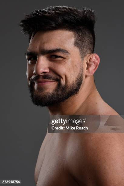 Kelvin Gastelum poses for a portrait backstage after his victory over Michael Bisping during the UFC Fight Night event inside the Mercedes-Benz Arena...