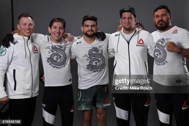 Kelvin Gastelum poses for a portrait backstage with his team after his victory over Michael Bisping during the UFC Fight Night event inside the...