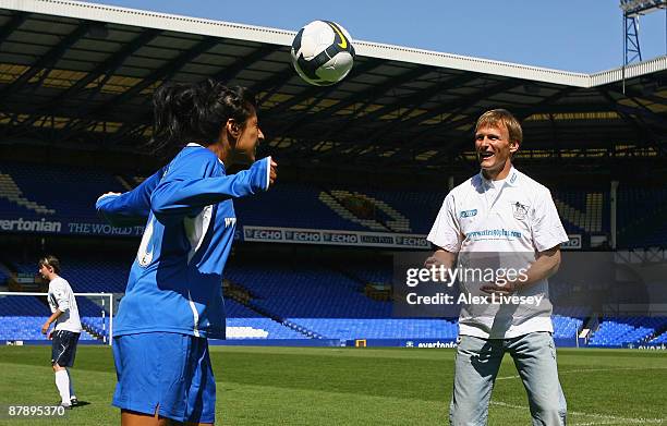 Teddy Sheringham warms up with Lena Kaur from Hollyoaks at the first ever All Female Football Aid Charity Game with Wrigley's Extra 90+ at Goodison...