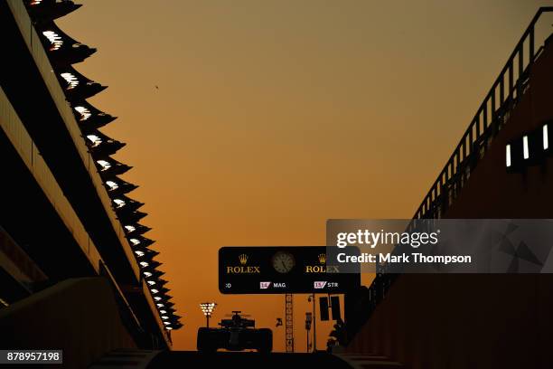 Lewis Hamilton of Great Britain driving the Mercedes AMG Petronas F1 Team Mercedes F1 WO8 in the Pitlane during qualifying for the Abu Dhabi Formula...