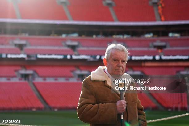 John Motson looks on ahead of the Premier League match between Tottenham Hotspur and West Bromwich Albion at Wembley Stadium on November 25, 2017 in...