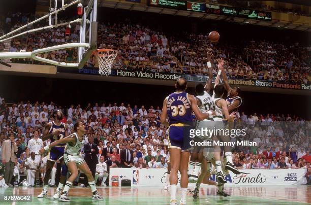 Finals: Los Angeles Lakers Magic Johnson in action, making junior sky hook shot during final seconds of game vs Boston Celtics Kevin McHale and...