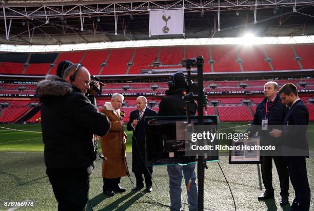 Commentator John Motson and former Tottenham Hotspur player, Osvaldo Ardiles prior to the Premier League match between Tottenham Hotspur and West...