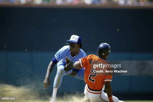 Toronto Blue Jays Tony Fernandez in action, making tag vs Baltimore Orioles Alan Wiggins . Baltimore, MD 6/14/1987 CREDIT: Jerry Wachter