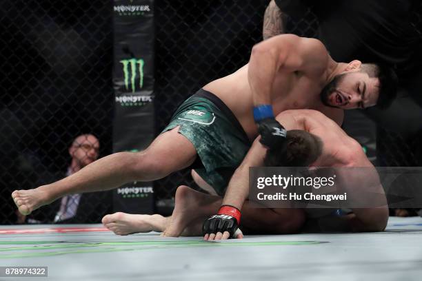 Kelvin Gastelum fights with Michael Bisping during the UFC Fight Night at Mercedes-Benz Arena on November 25, 2017 in Shanghai, China.