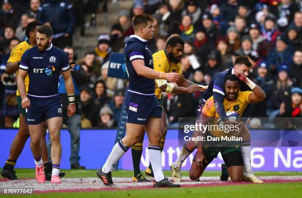 Tevita Kuridrani of Australia touches down for the first try during the international match between Scotland and Australia at Murrayfield Stadium on...