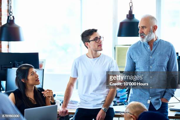 people working in modern office - group of mature men stock pictures, royalty-free photos & images