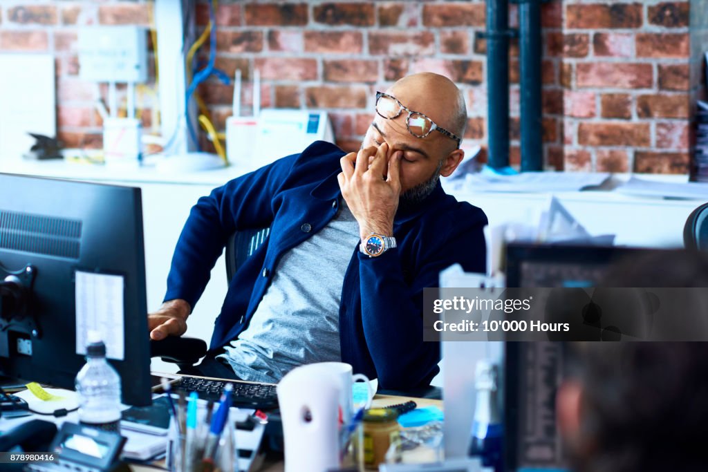 Man sitting in modern office