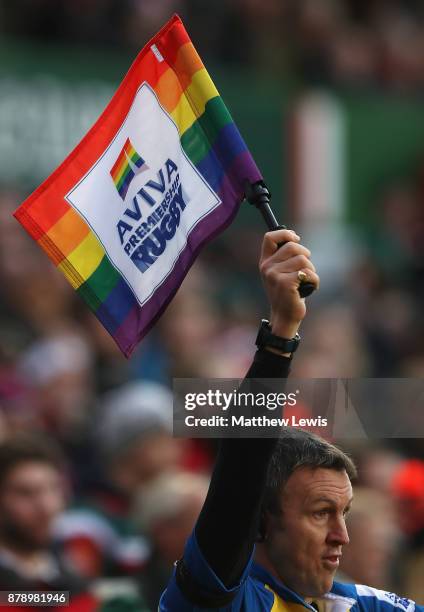 Linesman holds his touch flag up which shows his support to charity Stonewalls Rainbow Laces campaign, which is endorsing equality for LGBT fans and...