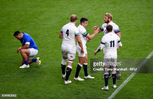 Alex Lozowski of England celerbates scoring his sides second try with his England team mates during the Old Mutual Wealth Series match between...