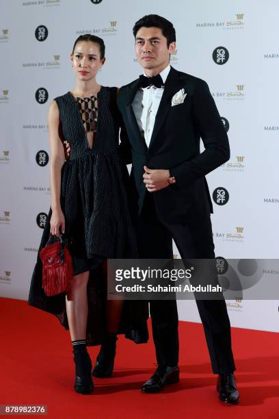 Henry Golding and Liv Lo attend The Singapore International Film Festival Benefit Dinner Red Carpet at Sands Expo and Convention Centre on November...