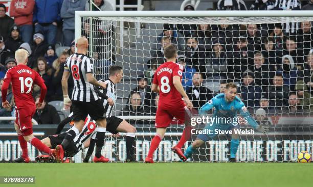Will Hughes of Watford scores his sides first goal during the Premier League match between Newcastle United and Watford at St. James Park on November...