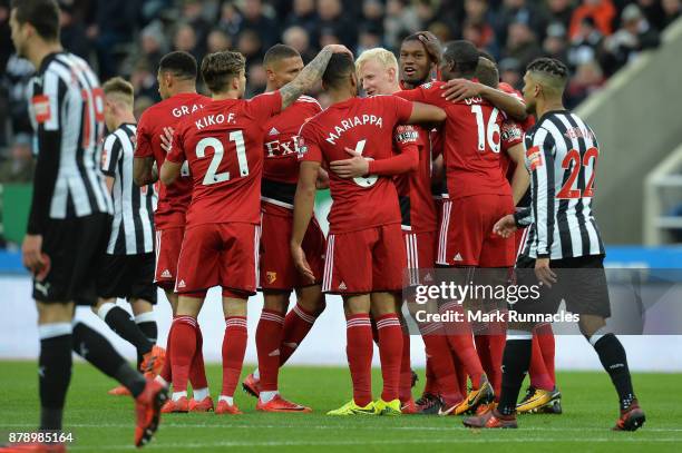 Will Hughes of Watford celebrates scoring his sides first goal with his Watford team mates during the Premier League match between Newcastle United...