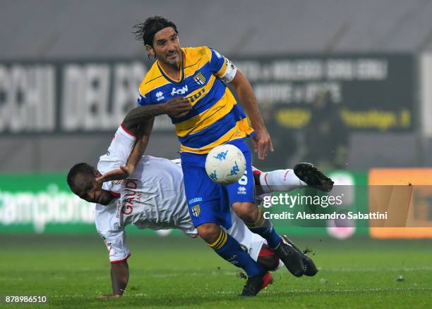 Jerry Mbakogu of FC Carpi competes for the ball whit Alessandro Lucarelli of Parma Calcio during the Serie B match between Carpi FC and Parma Calcio...