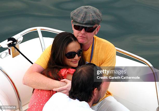 Chris Evans and wife Natasha Shishmanian depart the Red Bull hospitality centre by boat after practice for the Monaco Formula One Grand Prix at the...