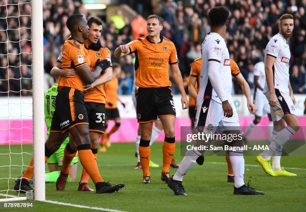 Willy Boly of Wolverhampton Wanderers scores a goal to make it 1-0 during the Sky Bet Championship match between Wolverhampton and Bolton Wanderers...