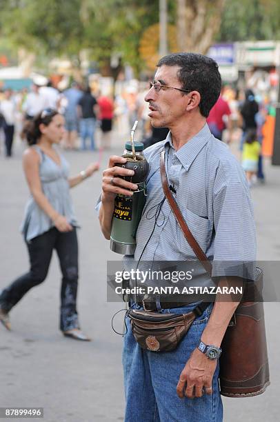 An Uruguayan gets out equipped with the "mate" tea and the "matera" March 16, 2008 in Montevideo. Drinking mate, a quite popular habit in Uruguay,...
