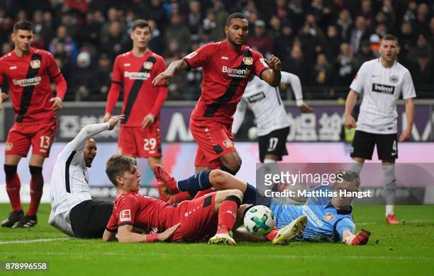 Goalkeeper Bernd Leno of Leverkusen saves a ball of Sebastien Haller of Frankfurt during the Bundesliga match between Eintracht Frankfurt and Bayer...