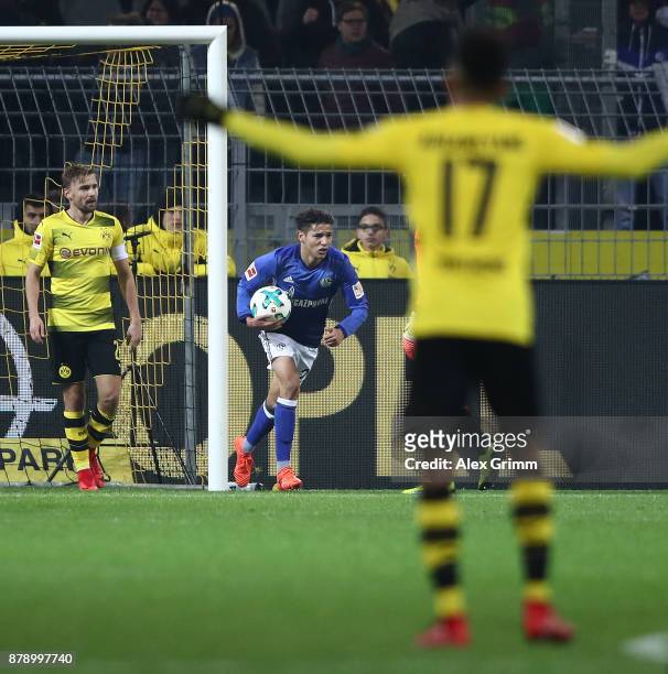 Amine Harit of Schalke carries the ball after he scored to make it 2:4 during the Bundesliga match between Borussia Dortmund and FC Schalke 04 at...