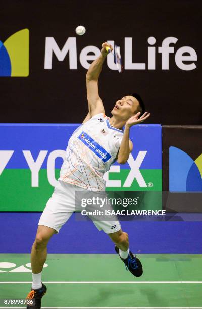 Malaysia's Lee Chong Wei hits a shot against China's Shi Yuqi during their men's singles semi-final match at the Hong Kong Open badminton tournament...