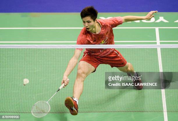 China's Shi Yuqi hits a shot against Malaysia's Lee Chong Wei during their men's singles semi-final match at the Hong Kong Open badminton tournament...