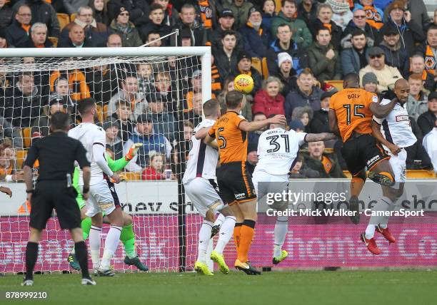 Wolverhampton Wanderers Willy Boly scores his sides first goal beating Bolton Wanderers Ben Alnwick during the Sky Bet Championship match between...