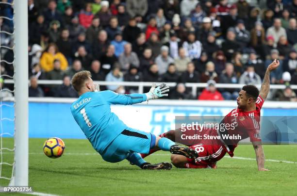 Andre Gray of Watford scores his sides third goal past Robert Elliot of Newcastle United during the Premier League match between Newcastle United and...