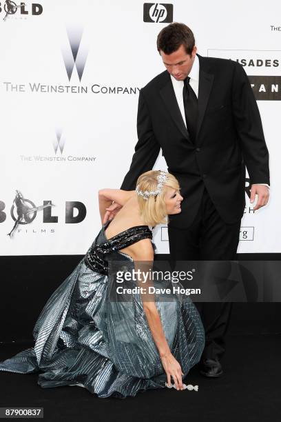 Doug Reinhardt and Paris Hilton arrive for amfAR's Cinema Against AIDS 2009 benefit at the Hotel du Cap during the 62nd Annual Cannes Film Festival...