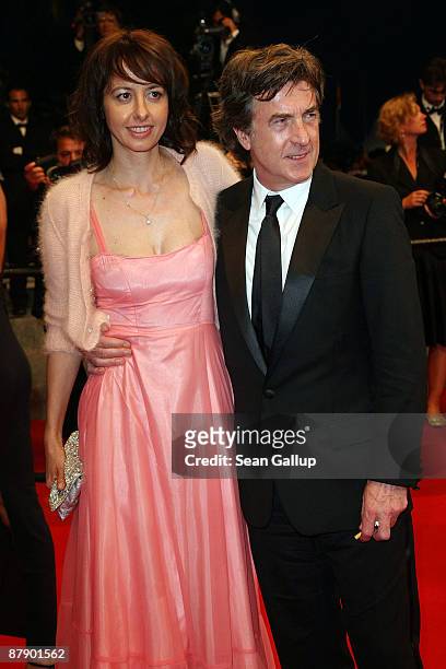 Actor Francois Cluzet and his wife Valerie Bonneton leave the "In The Beginning" Premiere held at the Palais Des Festivals during the 62nd...